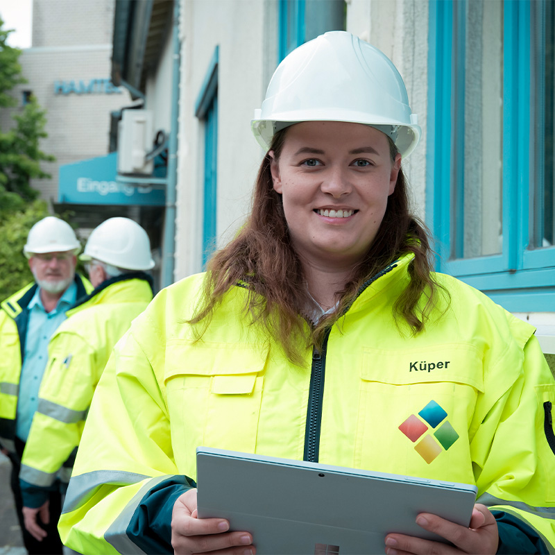 Frau in Arbeitskleidung Frau in Arbeitskleidung